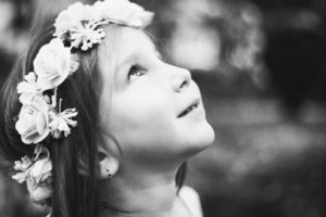 young girl wearing flower crown